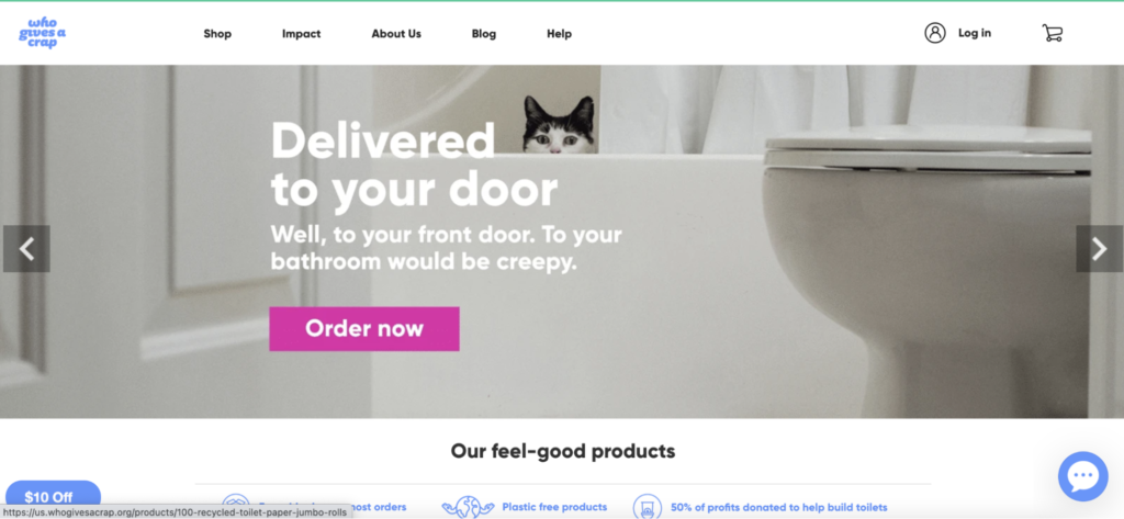 Homepage snapshot of Who Gives A Crap's—an ecommerce subscription business— website as shown by a cat hiding in the bathtub with a toilet in the foreground.