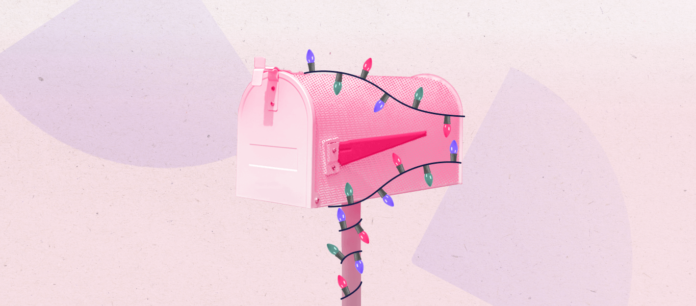 A mailbox wrapped in festive holiday lights