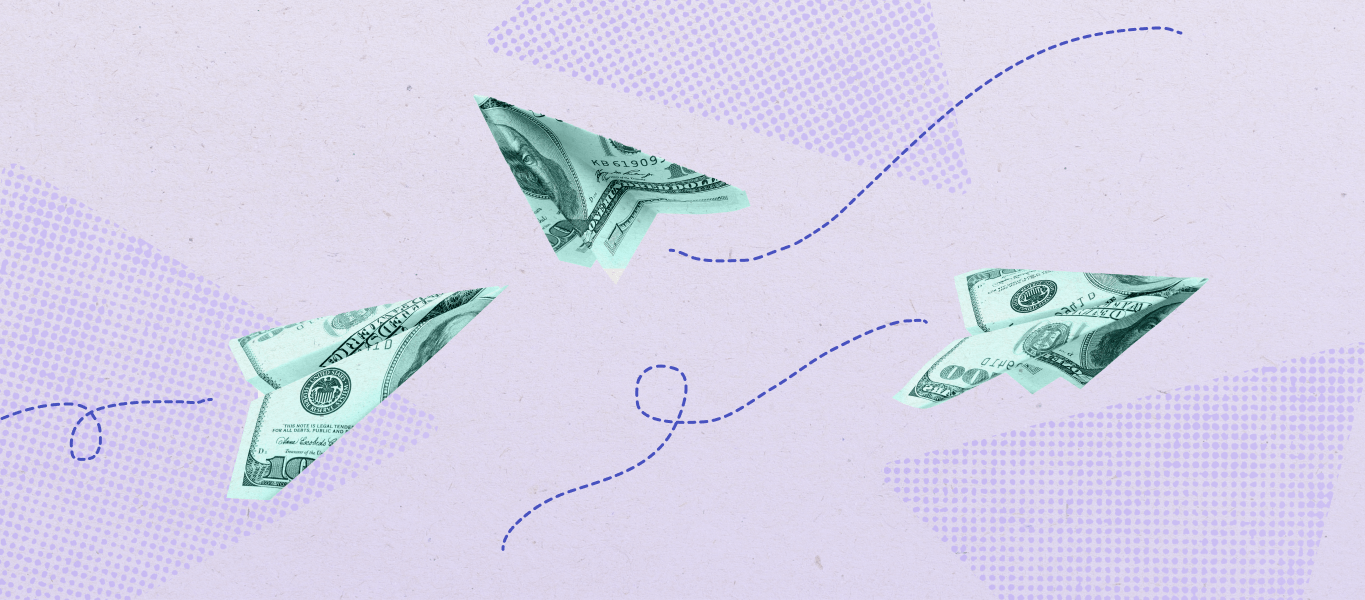 Dollar bills folded into paper airplanes floating on a purple background.