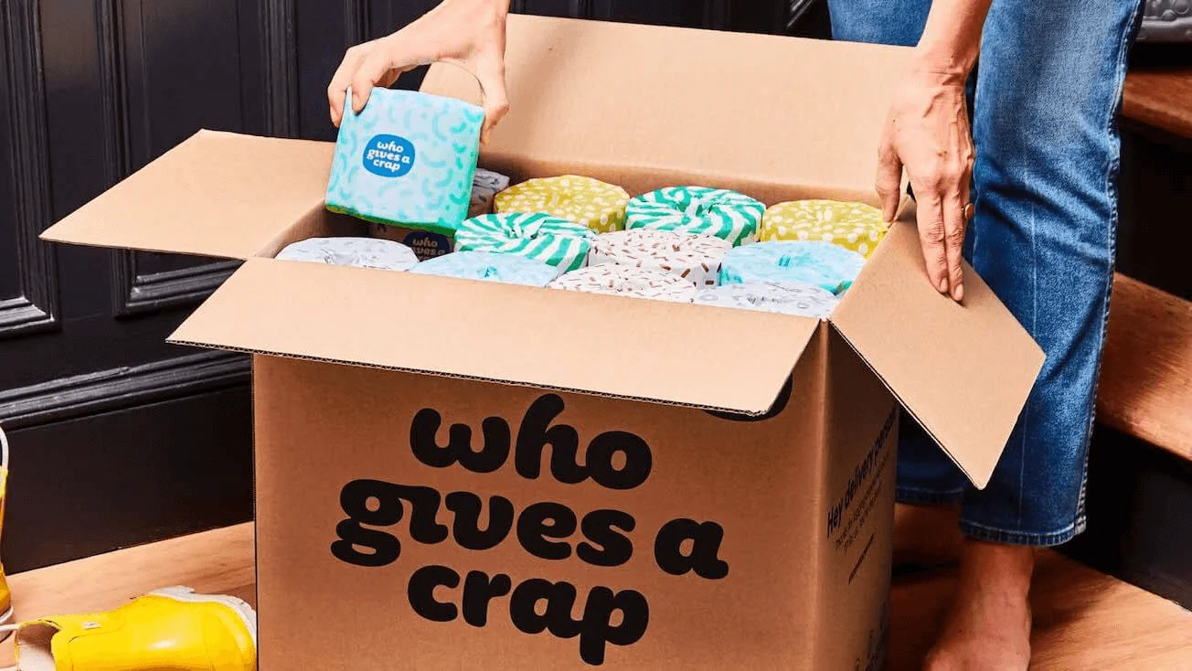 Cardboard box of Who Gives A Crap toilet paper rolls